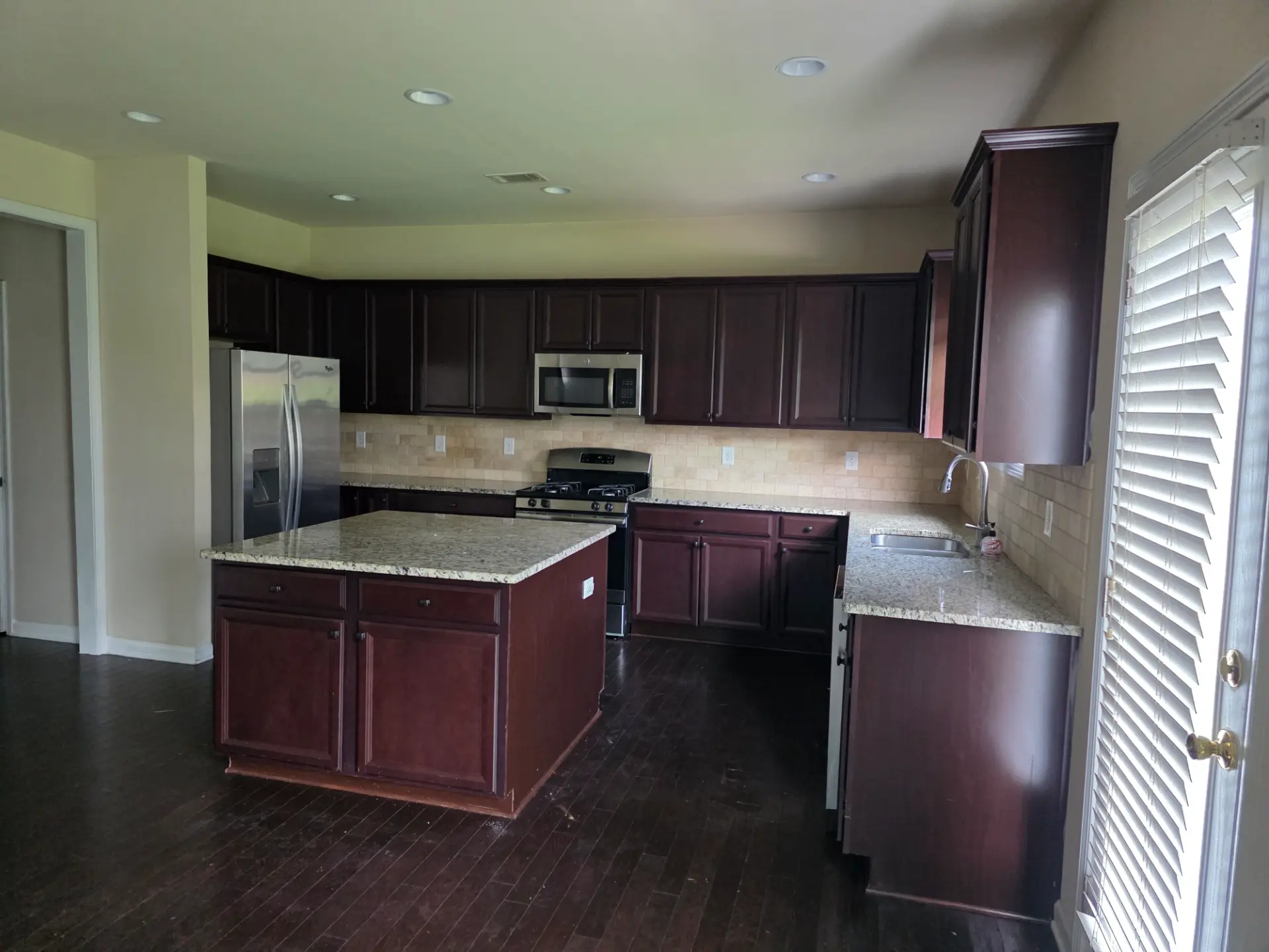 Before: dated kitchen prior to renovation in Cumming, GA